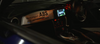 Subaru BRZ interior at night with Bosch Motorsport ABS display and 909 Motorsport dash banner at Sydney Motorsport Park