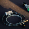 Bosch Motorsport DF11 wheel-speed sensor with toothed trigger ring and 909 Motorsport CNC-machined mounting bracket