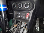 Mitsubishi Lancer EVO X cabin showing the Bosch ABS map switch and ABS-off switch panel