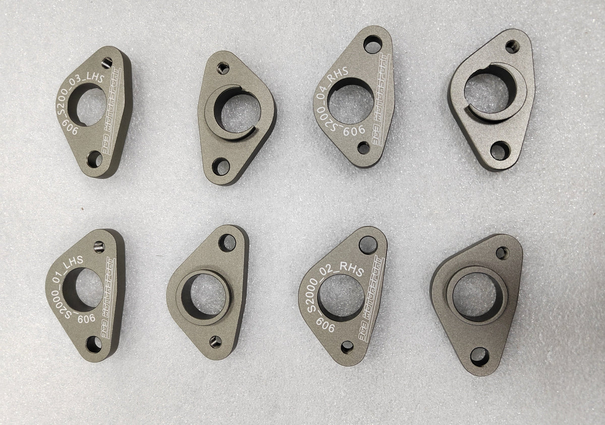 909 Motorsport wheel speed sensor mounts for the Honda S2000 - handed left and right, machined and anodised, shown front and back