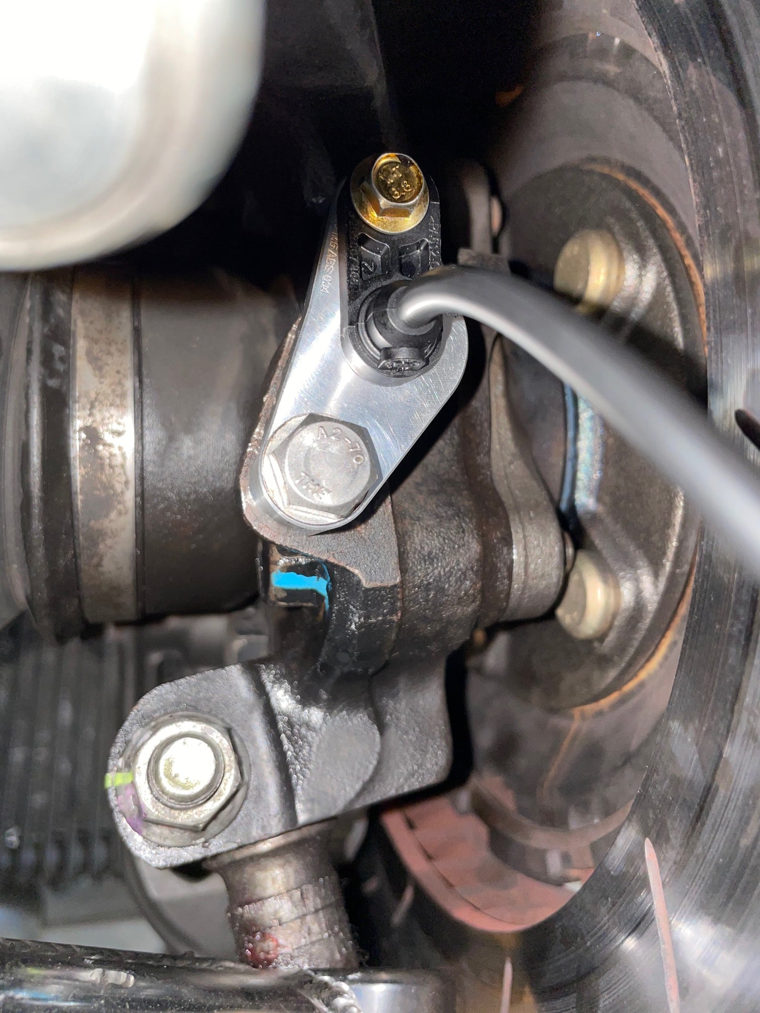 909 Motorsport billet wheel speed sensor mount and Bosch DF11 sensor at the EVO 7-9 hub