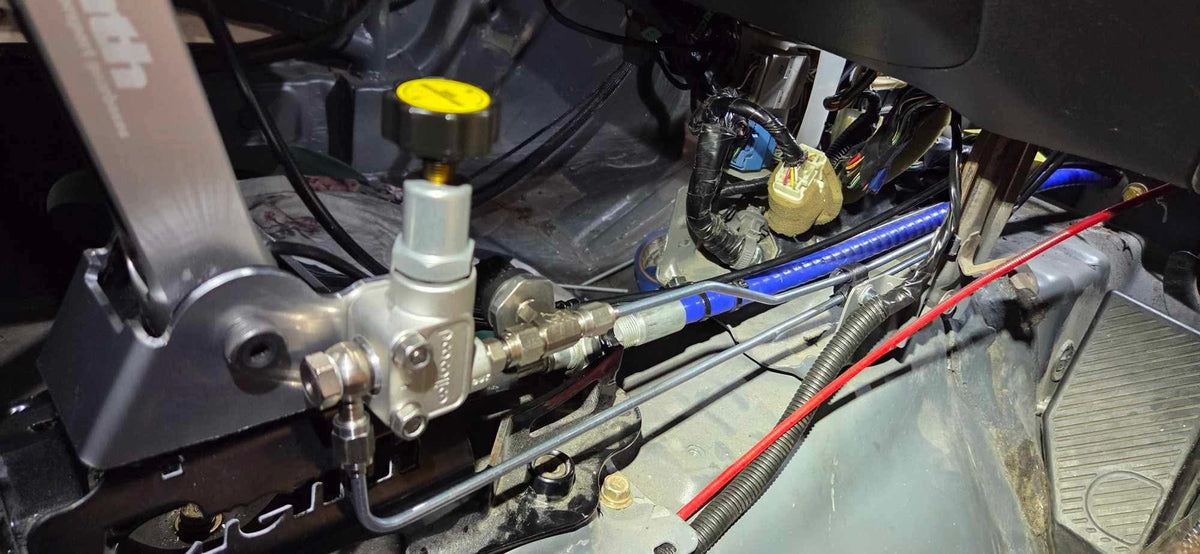 Under-bonnet brake bias valve installation on a Mitsubishi Lancer EVO 7-9
