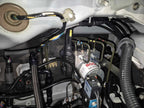 Bosch Motorsport M5 ABS hydraulic unit installed in the factory ABS location on a Mitsubishi Lancer EVO X