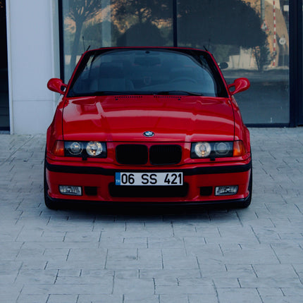 Red BMW E36 front view