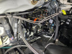 Factory Mitsubishi EVO X ABS unit before conversion — replaced in the same location by the Bosch Motorsport M5