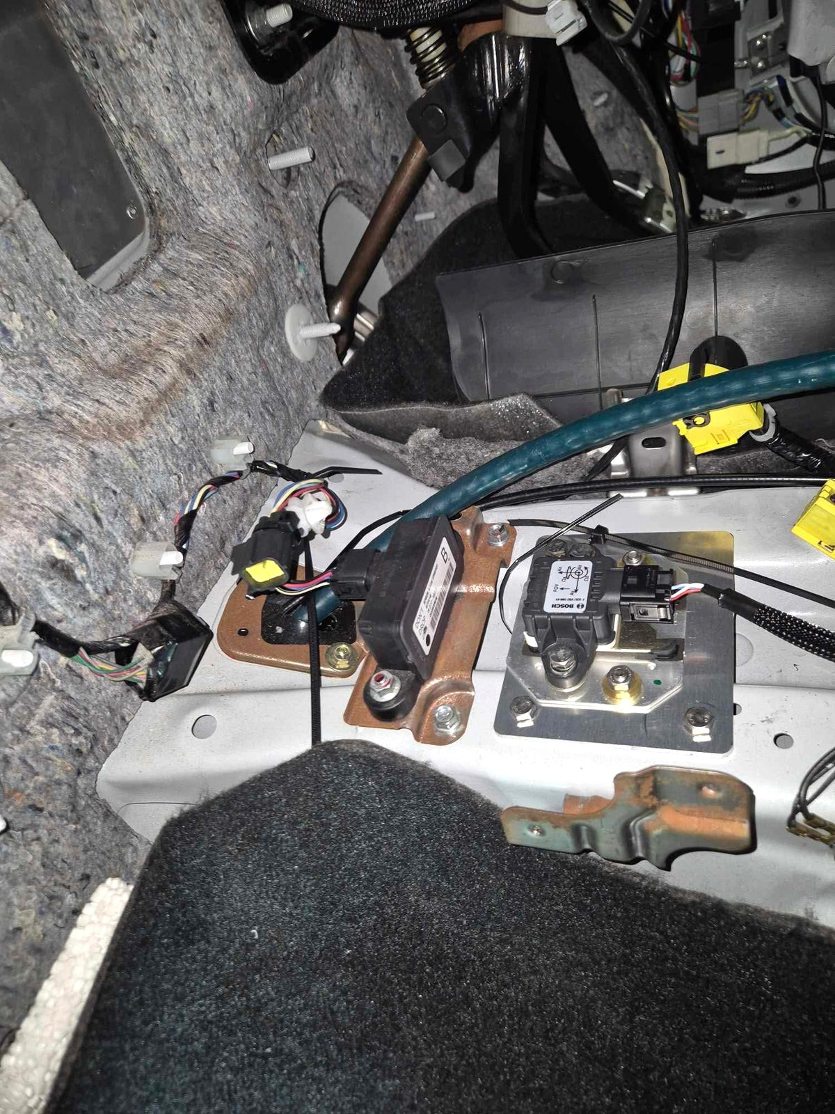 909 yaw sensor mount installed in a Mitsubishi Lancer EVO X