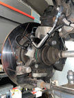 Front wheel speed sensor mount with Bosch DF11 sensor installed on a Nissan Skyline GT-R hub