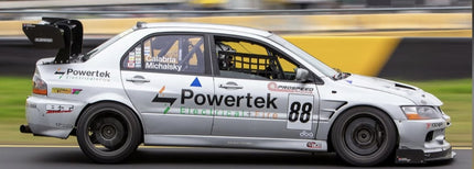 Powertek Racing Mitsubishi Lancer EVO time attack car at speed, running Bosch Motorsport M5 ABS