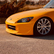 Yellow Honda S2000 AP2 front three quarter