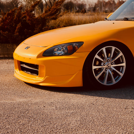 Yellow Honda S2000 AP2 front three quarter